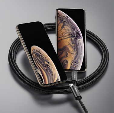 Two smartphones with abstract designs connected by a black USB cable, showcasing iPhone accessory upgrades, set against a grey background.